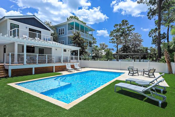 A backyard of a 30A vacation rental