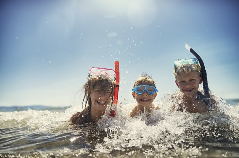 Children playing on a 30A beach