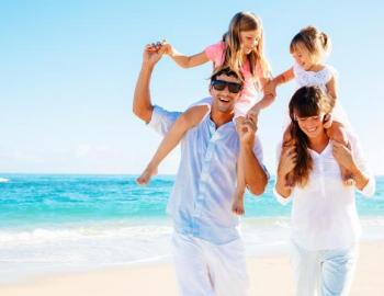 family on beach in florida