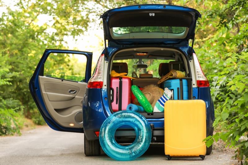 Modern car with luggage outdoors.