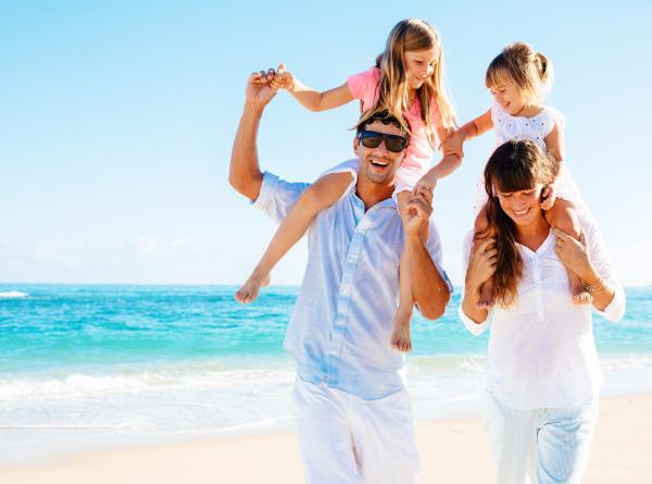 family on beach in florida