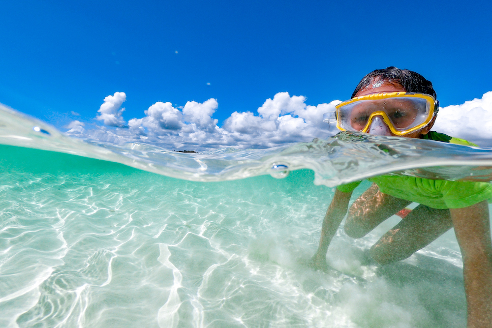 little girl snorkeling