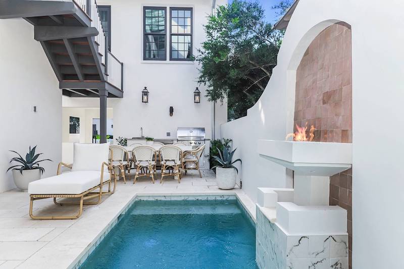An outdoor living space of a 30A vacation rental
